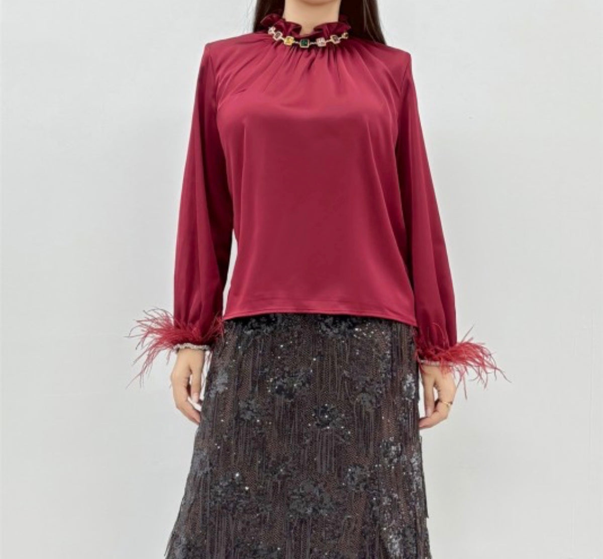 JEWELED RUFFLE NECK FEATHER CUFF BLOUSE