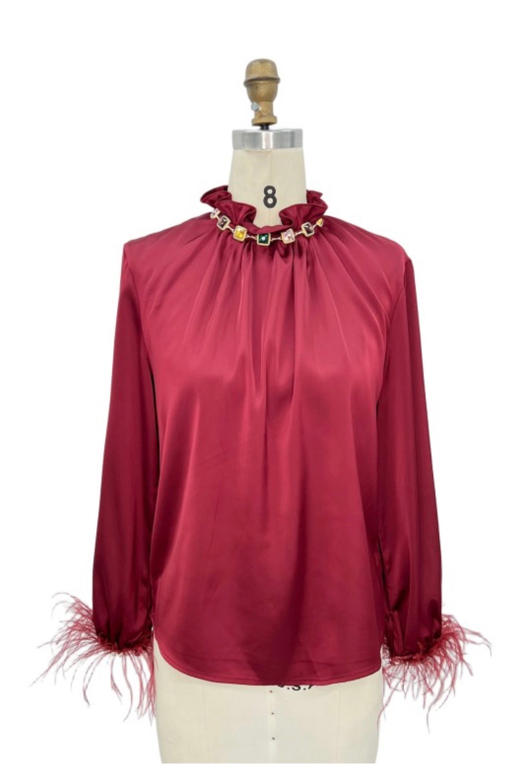 JEWELED RUFFLE NECK FEATHER CUFF BLOUSE