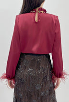 JEWELED RUFFLE NECK FEATHER CUFF BLOUSE