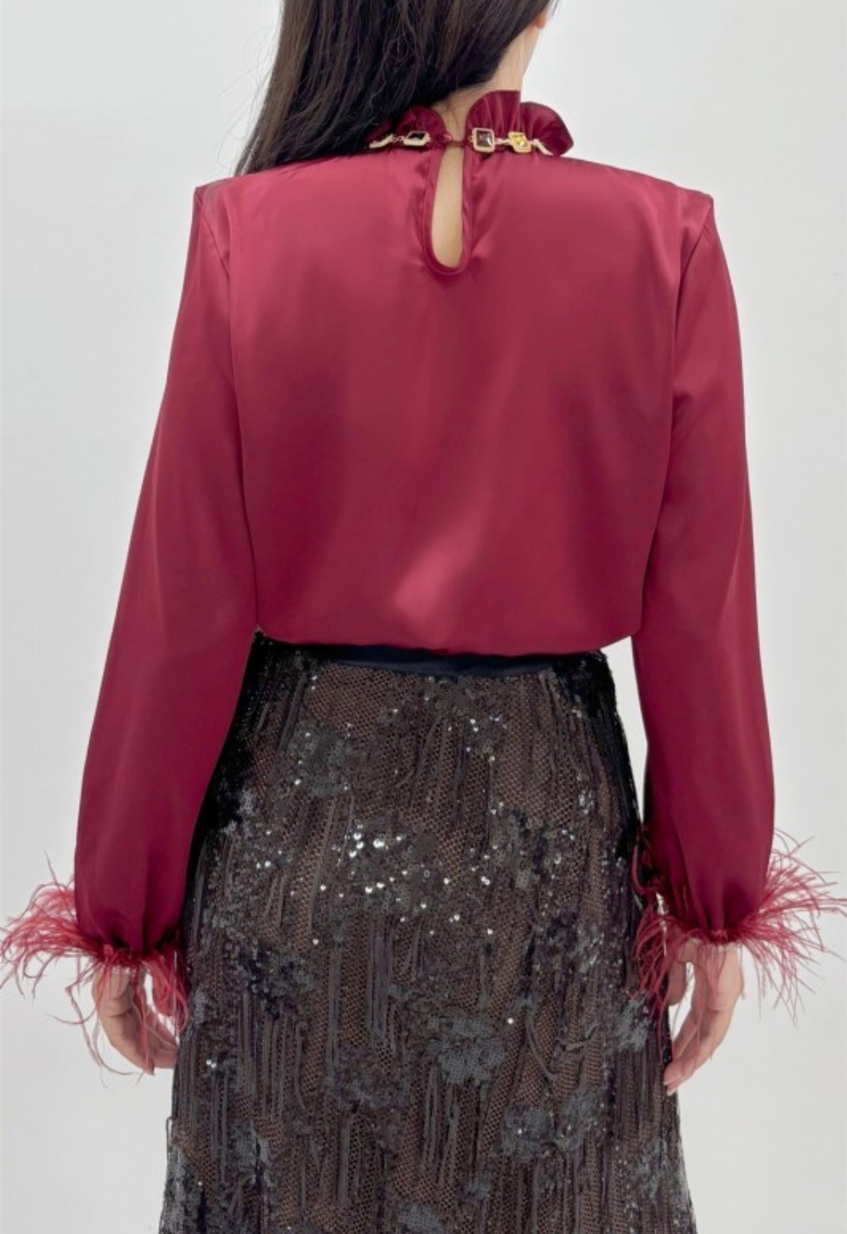 JEWELED RUFFLE NECK FEATHER CUFF BLOUSE